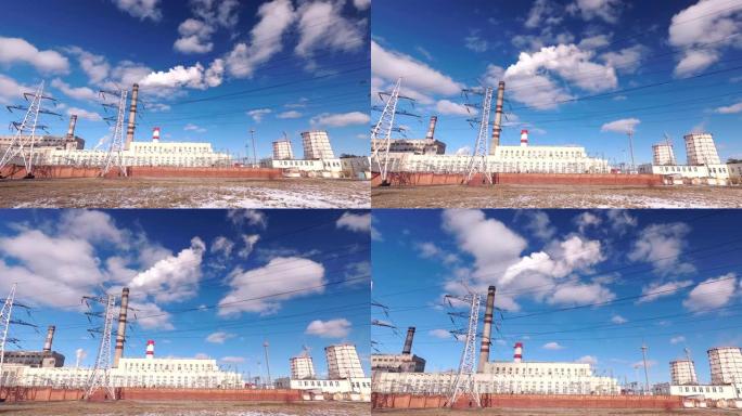 火力发电厂逆天蓝天云彩。摄像机接近物体。