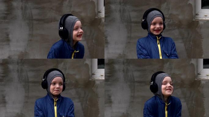 戴着无线耳机的男孩在街上听音乐
