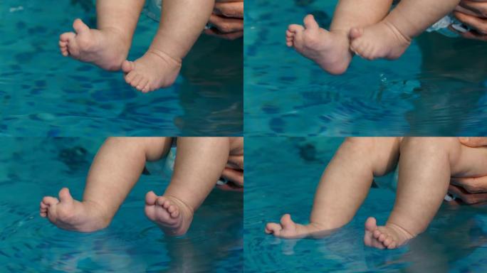 婴儿的脚碰到水