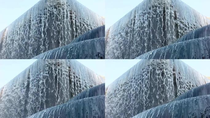 公园里的大喷泉，水流落入水中，在喷泉中产生泡沫，慢动作全高清，1080页。