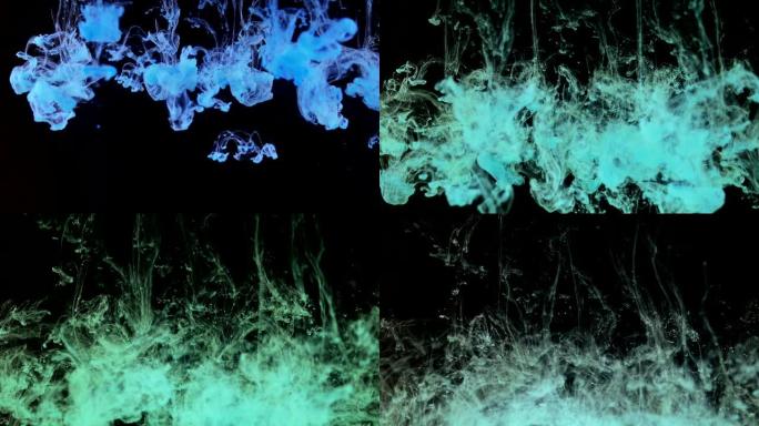 蓝色在黑色背景上的一滴液体中扩散。抽象油漆爆炸。