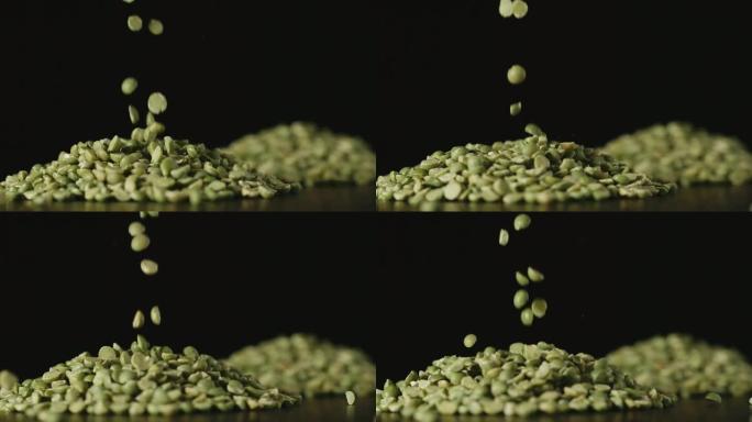 慢动作: 绿豌豆倒在桌子上-特写
