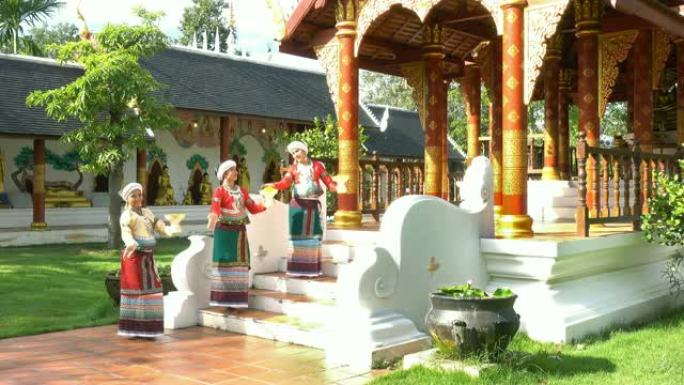 4k泰国古典舞，美女穿传统泰国服装在寺庙里制作传统泰国舞蹈