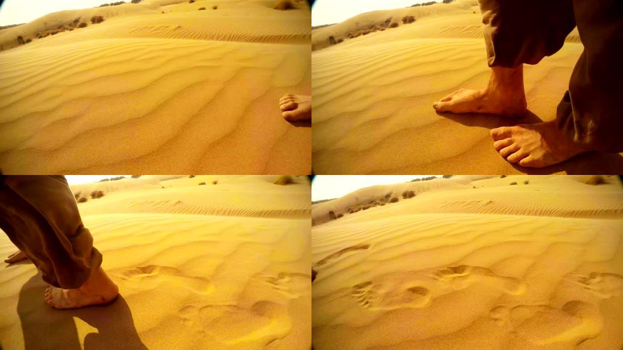 穿着宽松裤子的沙漠男性赤脚沿着沙丘走左边脚印特写拉贾斯坦邦侧视图