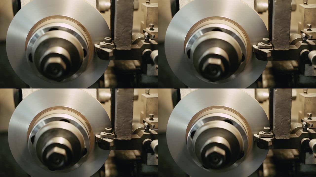车库车间磨削固定制动系统磨削盘式刹车机特写。慢动作特写镜头。