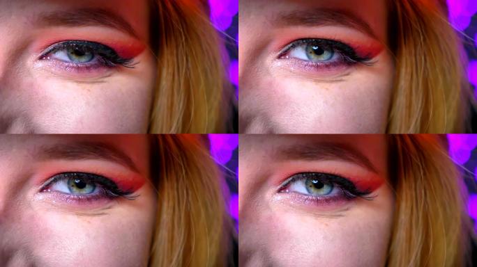 令人惊叹的眼妆粉色阴影特写美丽绘制的眼线和调色的眉毛