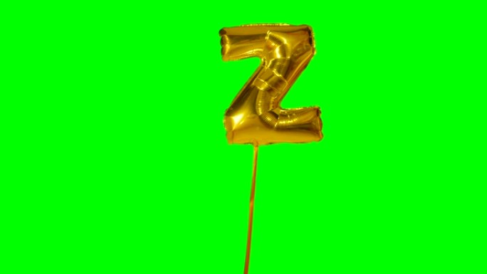 字母Z来自漂浮在绿色屏幕上的字母氦气金气球