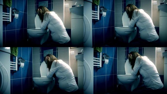 年轻女子在浴室厕所呕吐-怀孕期间晨吐