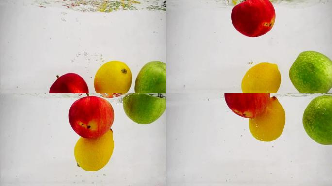 橙子、苹果和柠檬在水中旋转，有气泡在慢动作。