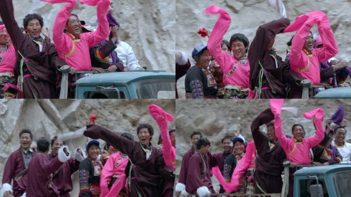 藏族群众在车上打招呼欢呼