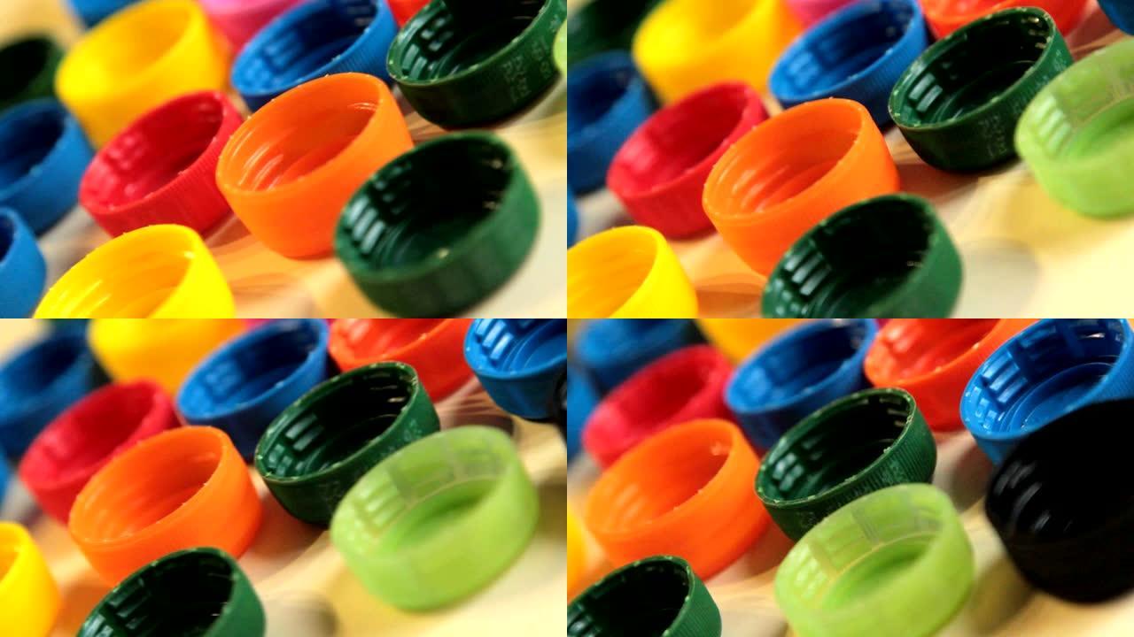 彩色塑料瓶盖。回收概念