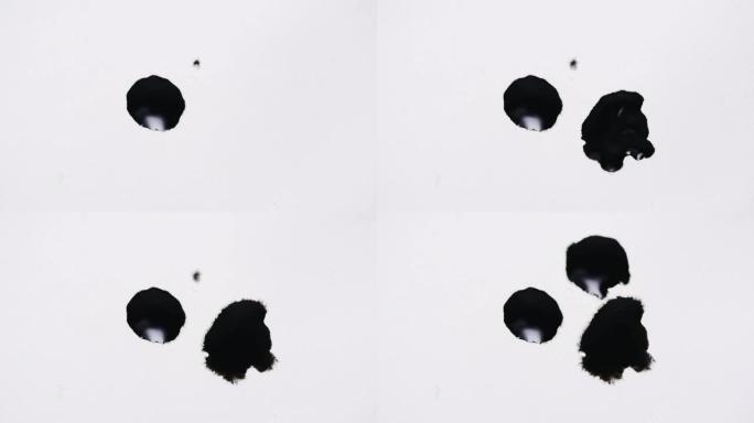 白纸上的黑色水色滴