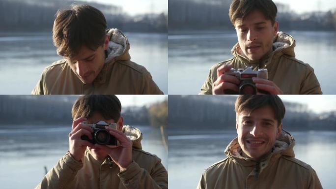 男子在冰冻的湖边拍照