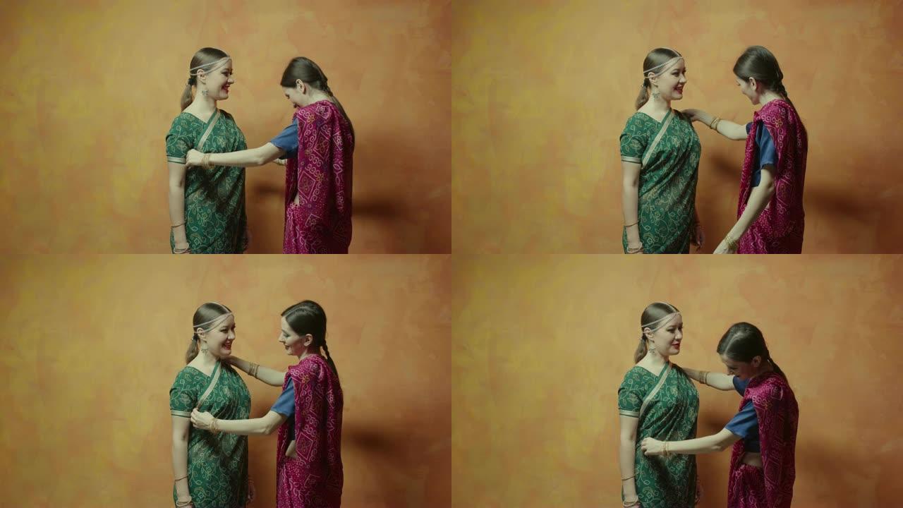 女性朋友穿着印度教纱丽和交流