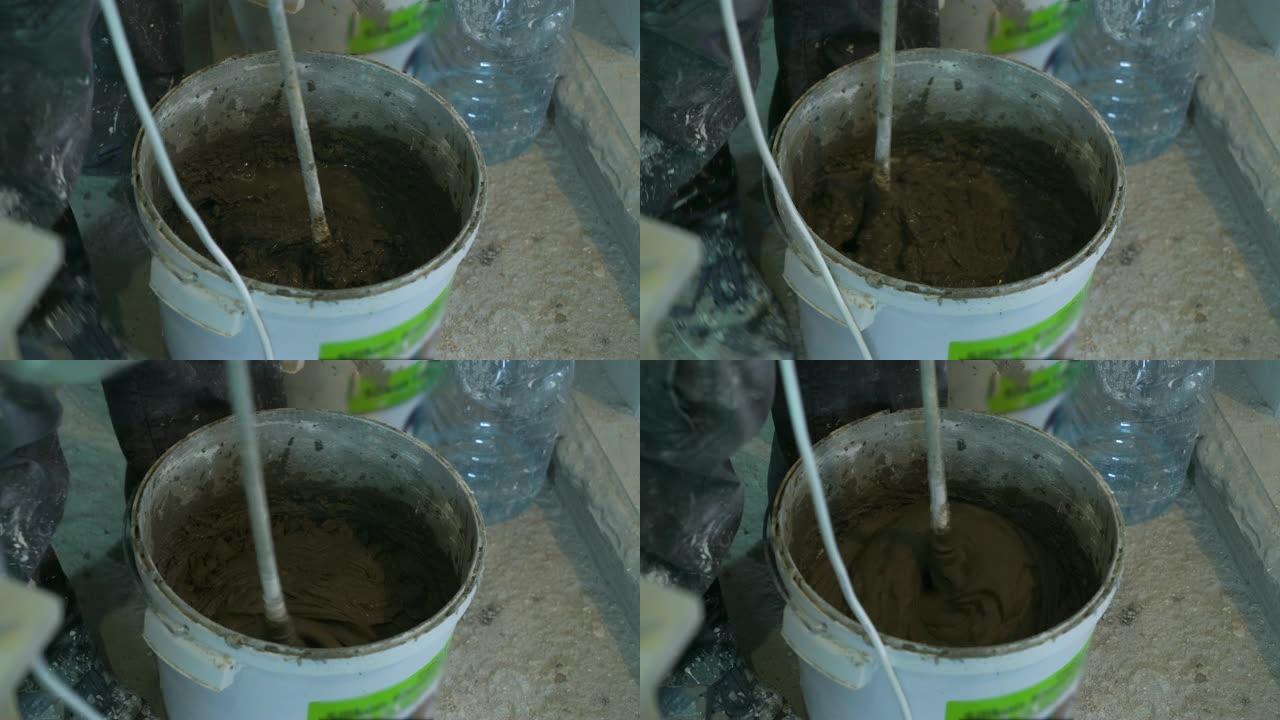 施工现场在桶中制作砂浆的特写