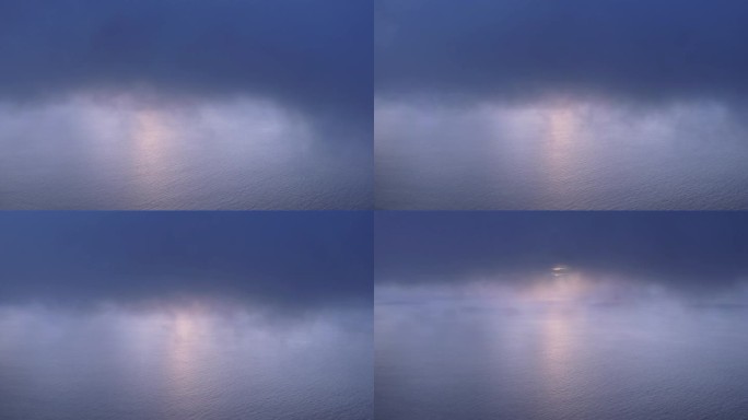 【4K航拍】透过云端-看平静的海面上夕阳
