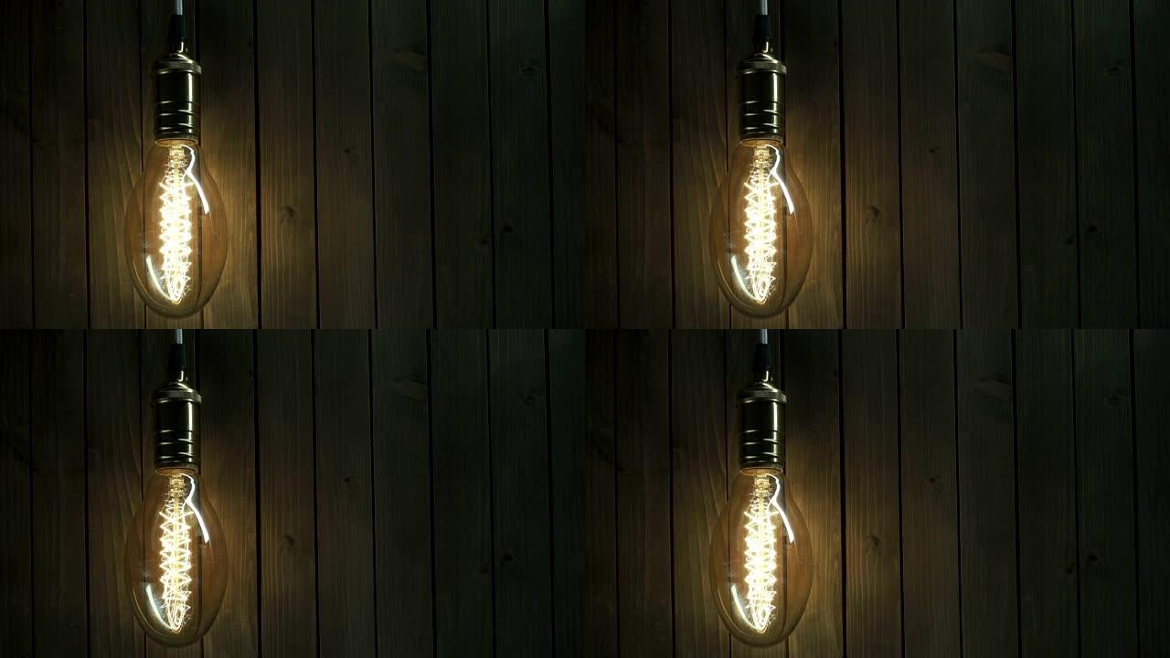灯泡在木制背景上发光