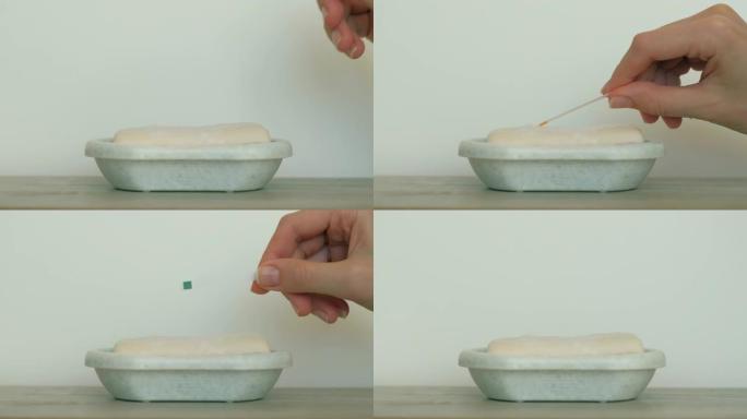 测试肥皂-碱性反应-石蕊试纸绿色。