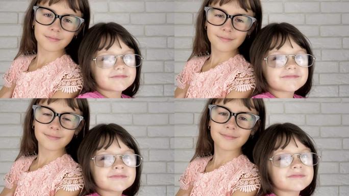 戴着眼镜的孩子双臂交叉站着。眼部护理。