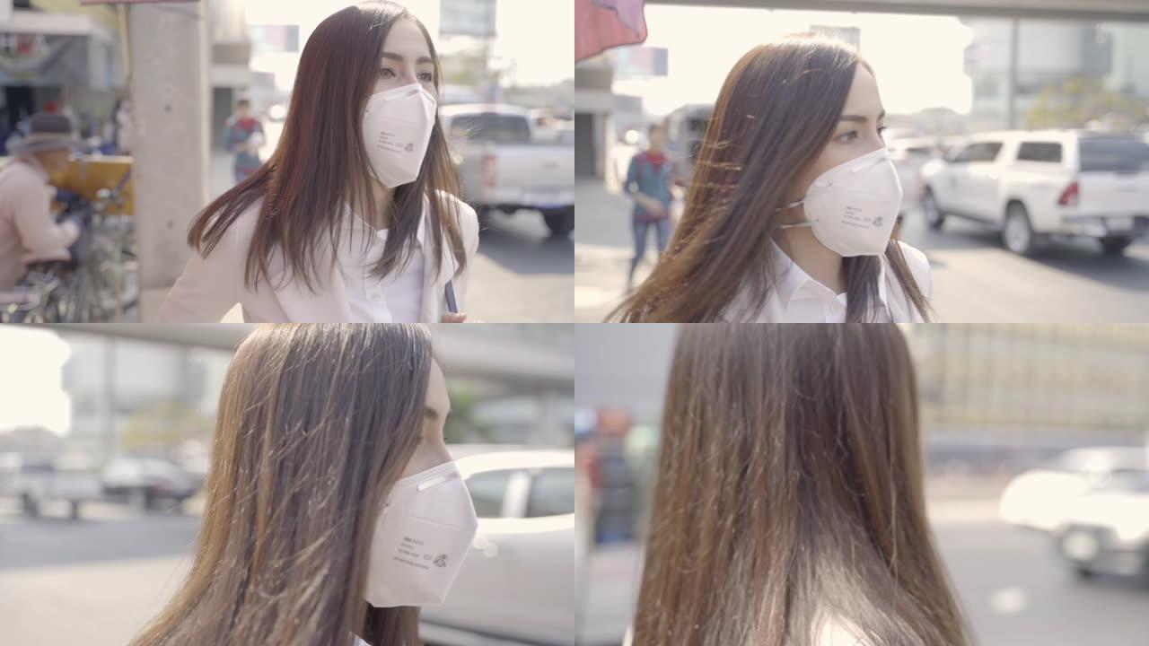亚洲女人要上班了，戴N95口罩，防PM2.5粉尘雾霾，她在咳嗽