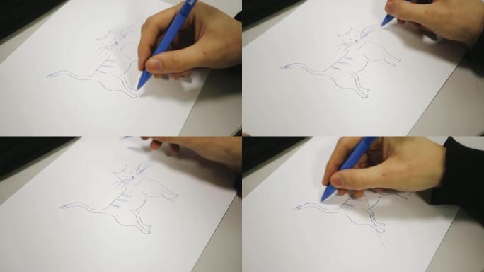 人在纸上画了一只猫