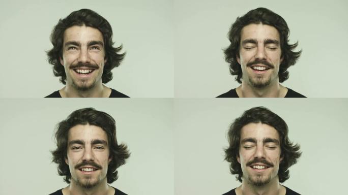 年轻的白人男子笑着表现出不同的兴奋表情