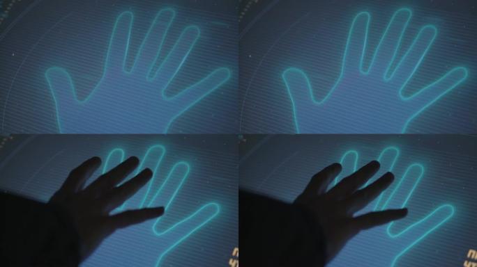 人类正在将他的手放在黑暗房间中显示的手掌轮廓上，特写镜头