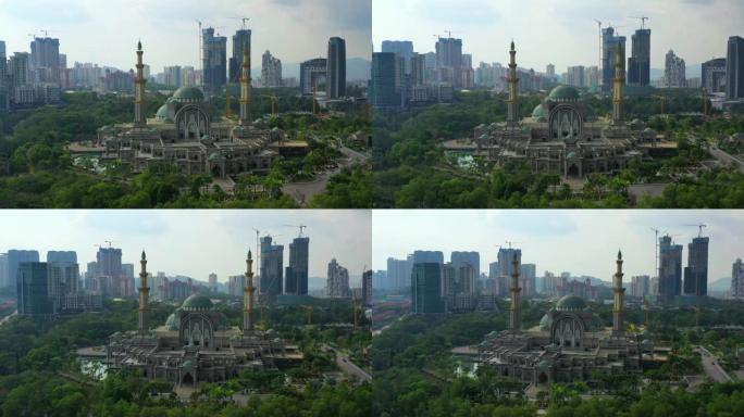 4k电影无人机飞越蓝色清真寺或苏丹萨拉赫丁阿卜杜勒阿齐兹沙阿清真寺地点，位于马来西亚吉隆坡附近的雪兰