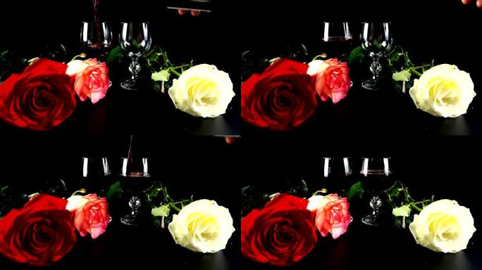 黑色背景上的酒杯和玫瑰。