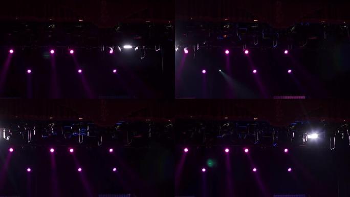 舞台上的灯光表演。多色舞台灯。