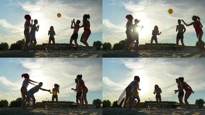 一群朋友在沙滩上享受时光，打排球