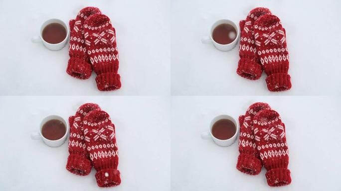 红色手套和一杯茶