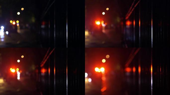 夜间救护车在雨中闪烁灯光，纽约哈林
