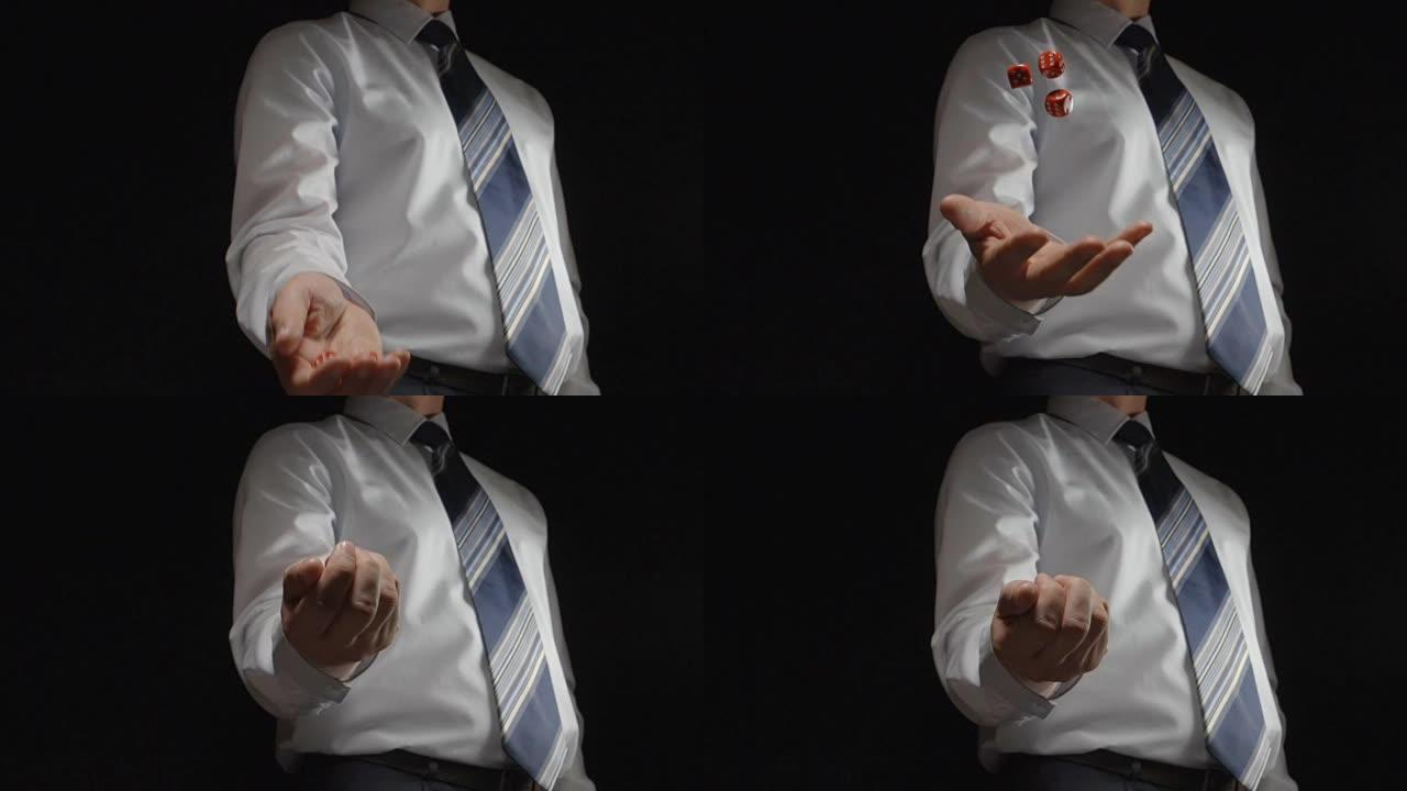 慢镜头:一名身穿浅色衬衫、打着领带的男子扔出几个玩方块