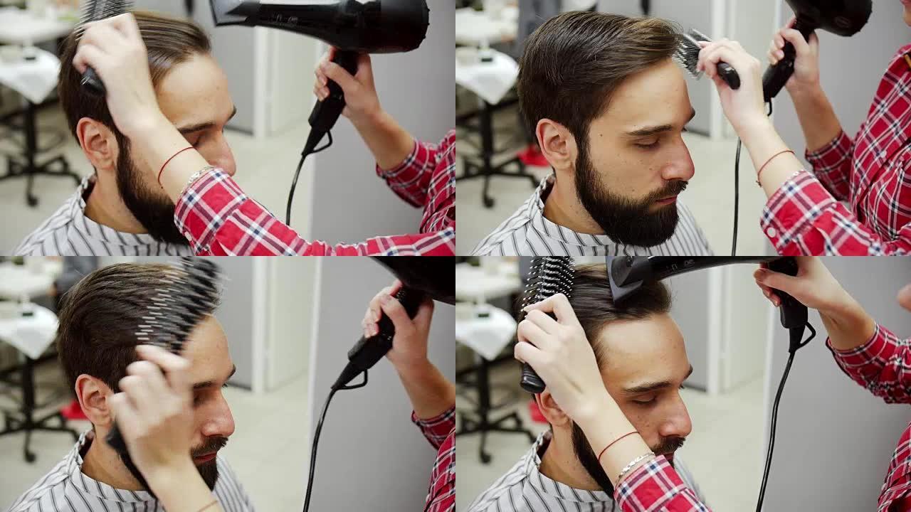 理发结束后，理发师吹干客户的头发。慢动作
