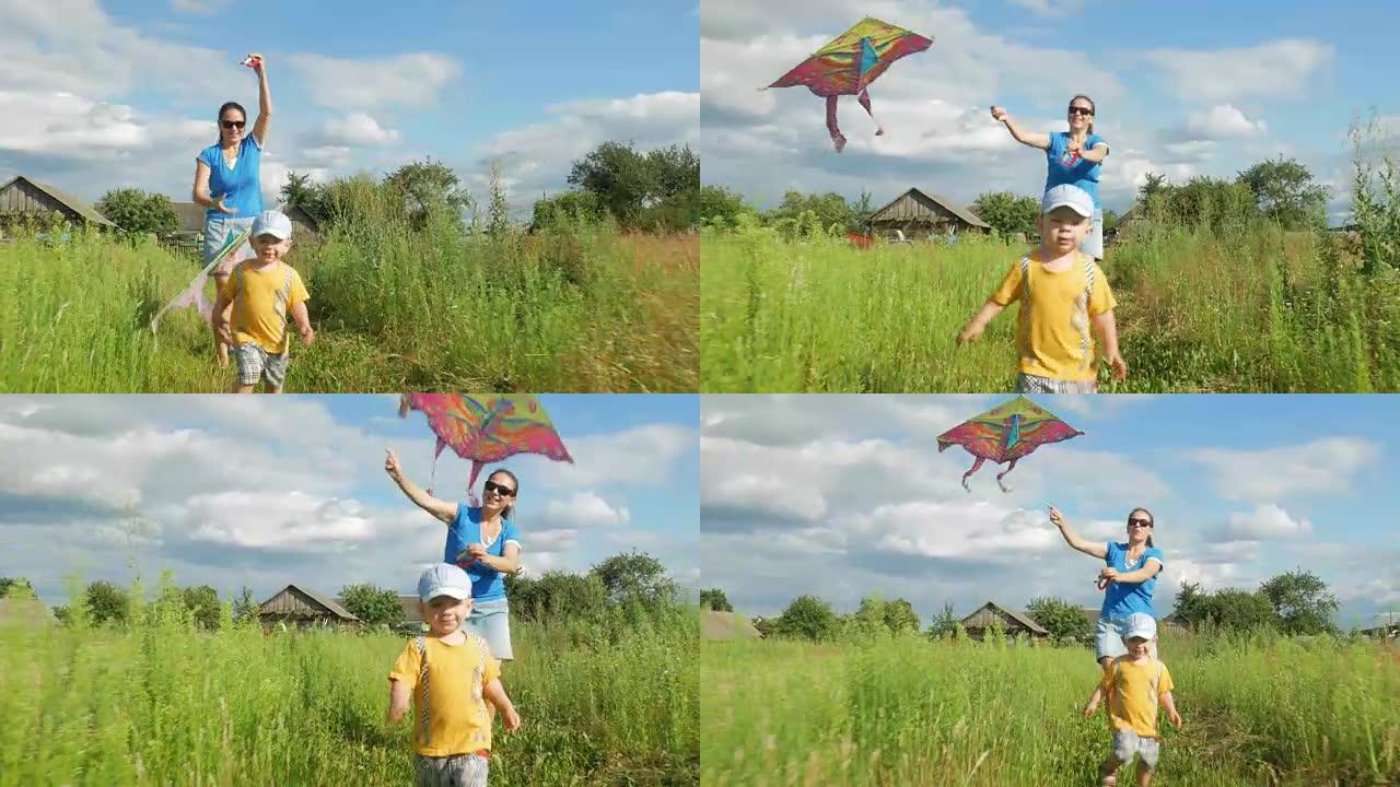 一位年轻的母亲带着婴儿在夏天在绿色的田野里发射空中风筝。母亲做得不好。儿子很开心