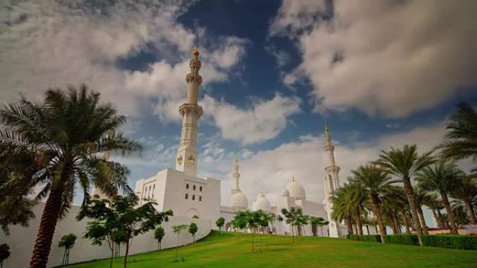 阳光明媚的日子阿布扎比世界著名的白色清真寺4k延时阿拉伯联合酋长国