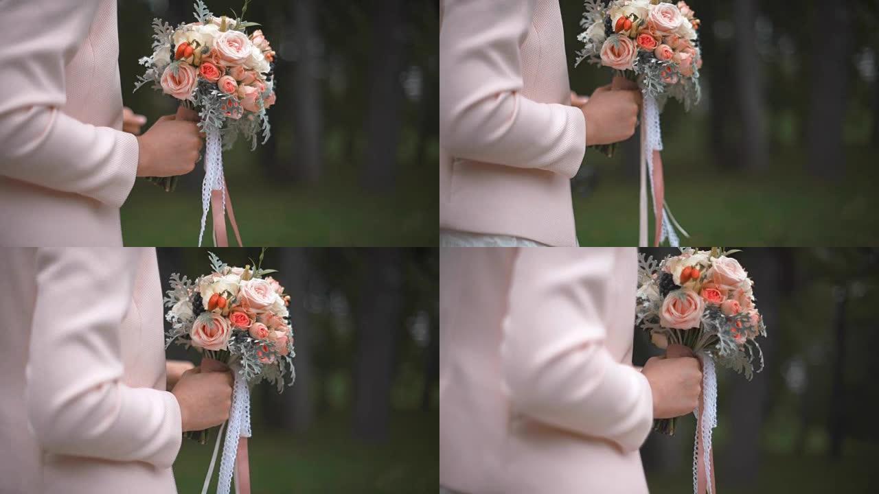 新娘手中的美丽婚礼花束