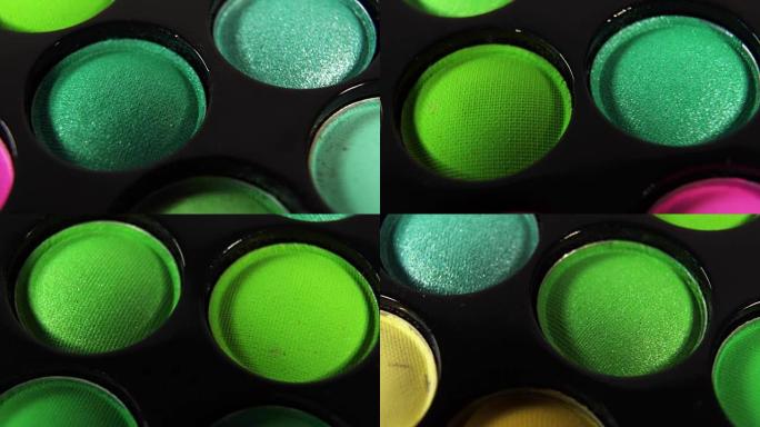 环形旋转彩色专业化妆品眼影调色板，超级微距拍摄。