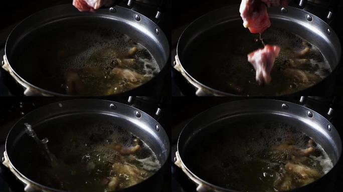 将新鲜鸡肉放入沸腾的泰国汤中的超级慢动作