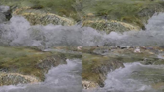慢动作视频中的山河中的水。