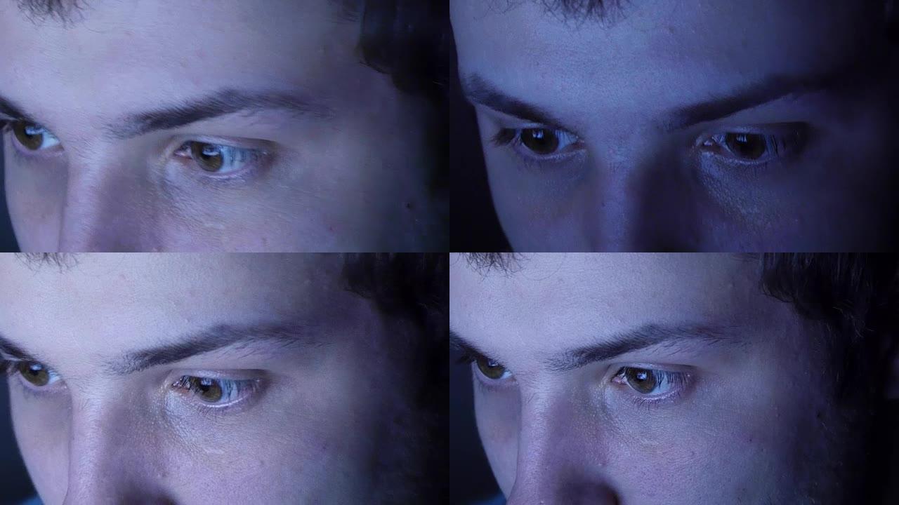 男人脸阅读互联网的特写镜头，晚上眼睛里有屏幕的反射