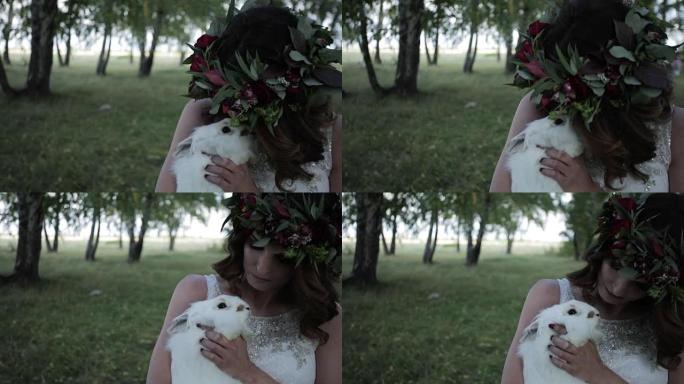 新娘爱抚森林中的兔子特写