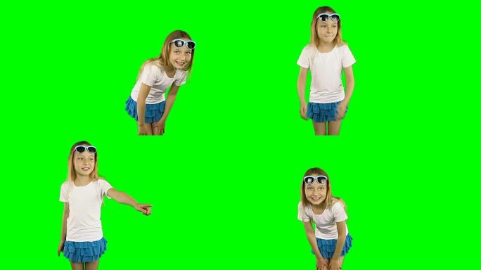小女孩正在展示她的手指和跳舞 ..戴着墨镜和t恤的女孩。剪辑包含绿色而不是阿尔法通道。