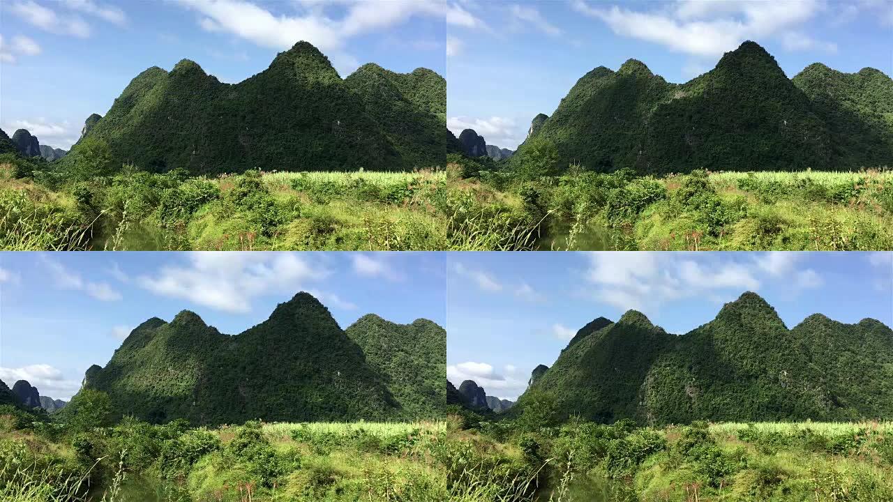 以滚山为背景的河流上的时间流逝