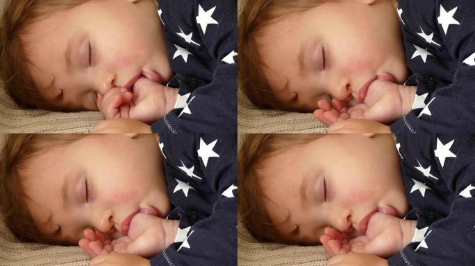 熟睡的孩子，婴儿吮吸拇指，手指