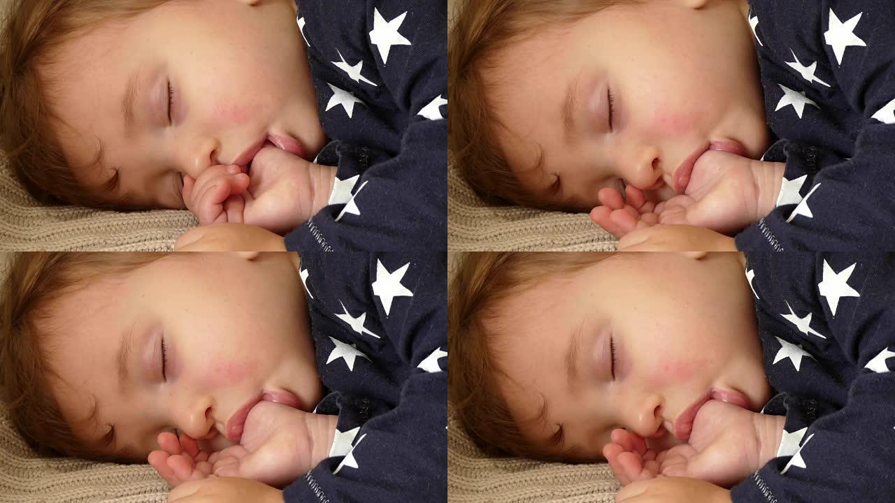 熟睡的孩子，婴儿吮吸拇指，手指