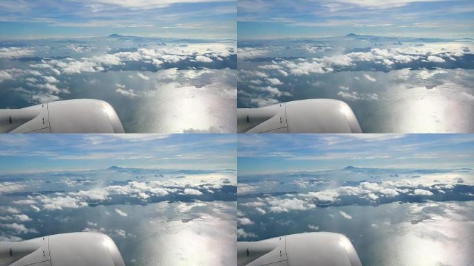 飞机的视野。飞机在云层中飞行。空中旅行概念。