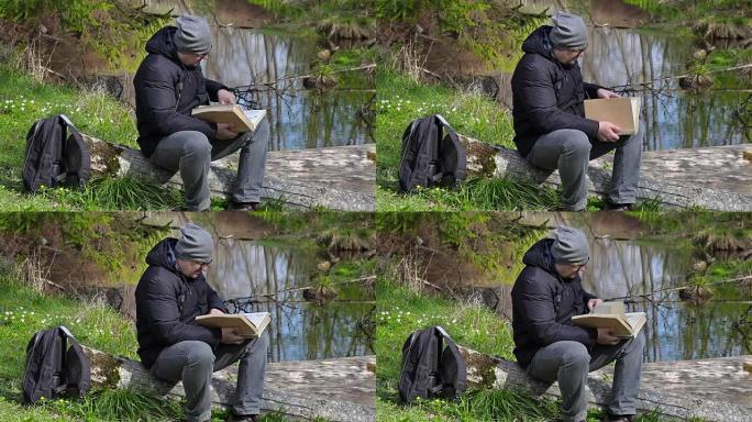 人在河边的草地上读书