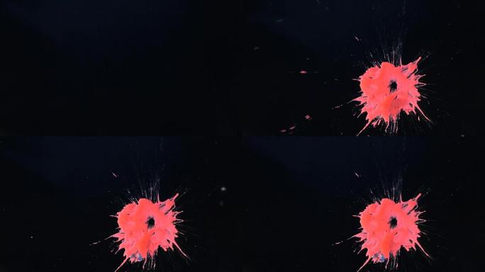 慢动作粉碎亮粉色油漆飞溅